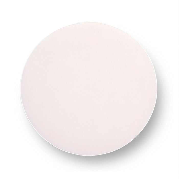 Tassy Tasseled Round Ottoman