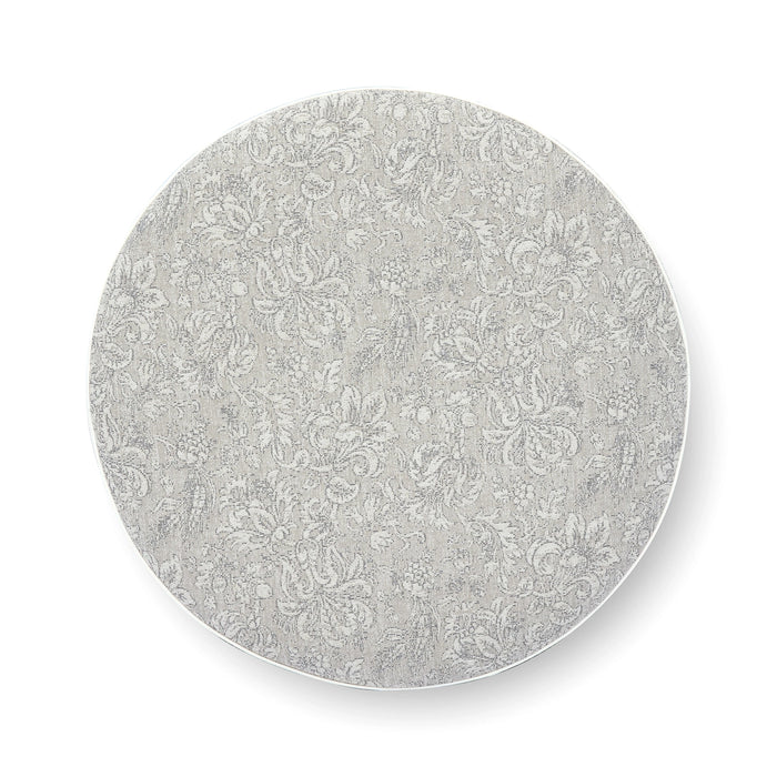 Tassy Tasseled Round Ottoman