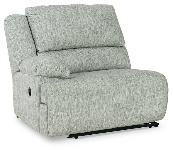 McClelland Reclining Sectional Loveseat with Console - Home And Beyond