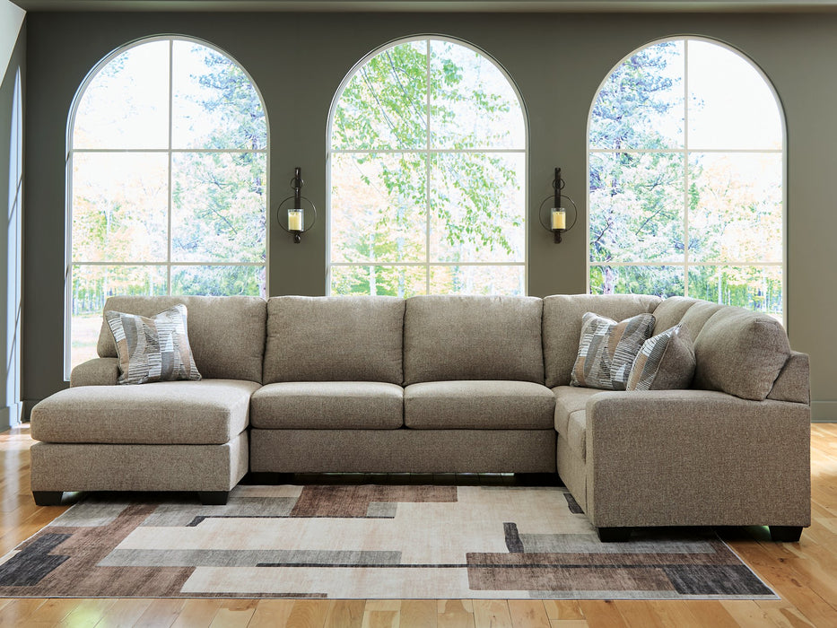 Newellen Sleeper Sectional with Chaise - Home And Beyond