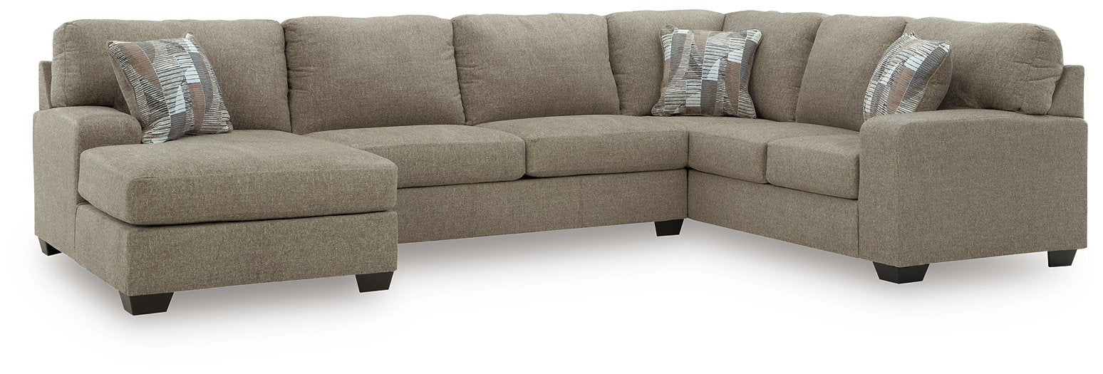 Newellen Sleeper Sectional with Chaise - Home And Beyond