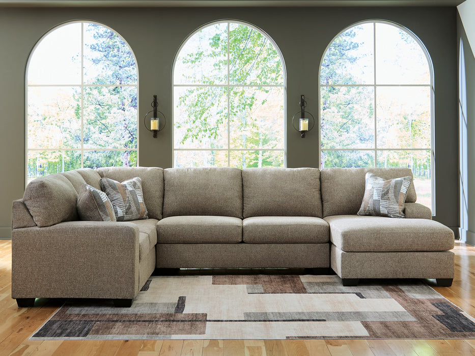 Newellen Sleeper Sectional with Chaise - Home And Beyond