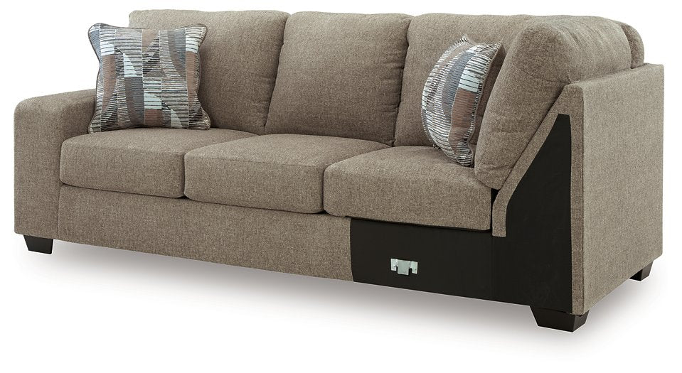 Newellen Sleeper Sectional with Chaise - Home And Beyond