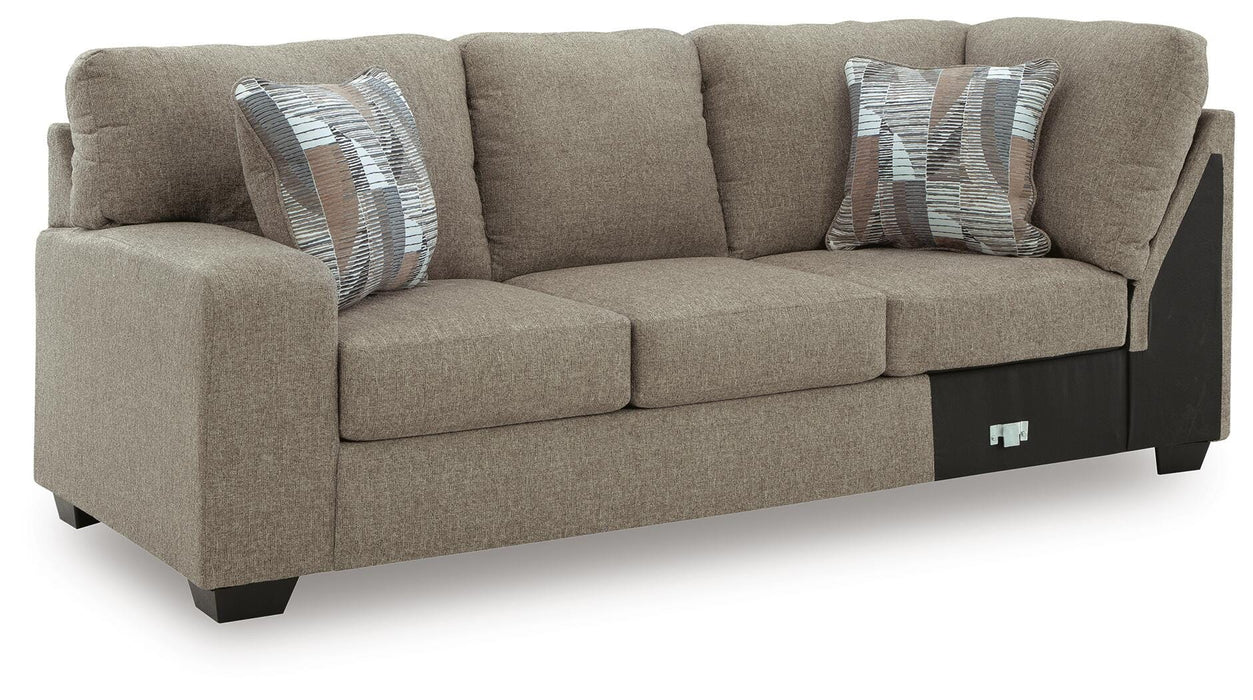 Newellen Sleeper Sectional with Chaise - Home And Beyond