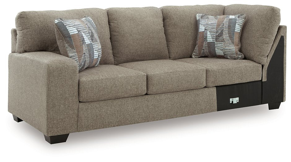 Newellen Sleeper Sectional with Chaise - Home And Beyond