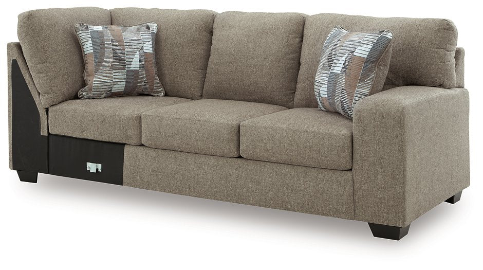 Newellen Sleeper Sectional with Chaise - Home And Beyond