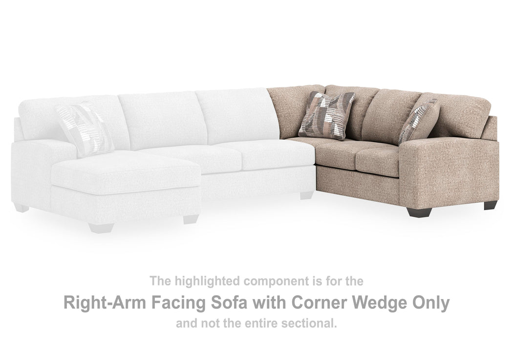 Newellen Sleeper Sectional with Chaise - Home And Beyond