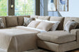 Newellen Sleeper Sectional with Chaise - Home And Beyond