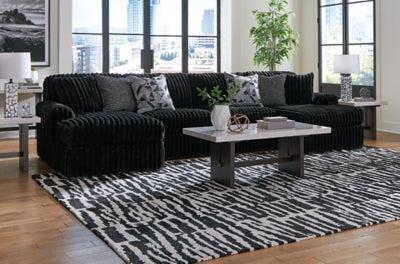 Midnight-Madness Sectional with Chaise - Home And Beyond