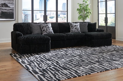 Midnight-Madness Sectional with Chaise - Home And Beyond