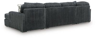 Midnight-Madness Sectional with Chaise - Home And Beyond