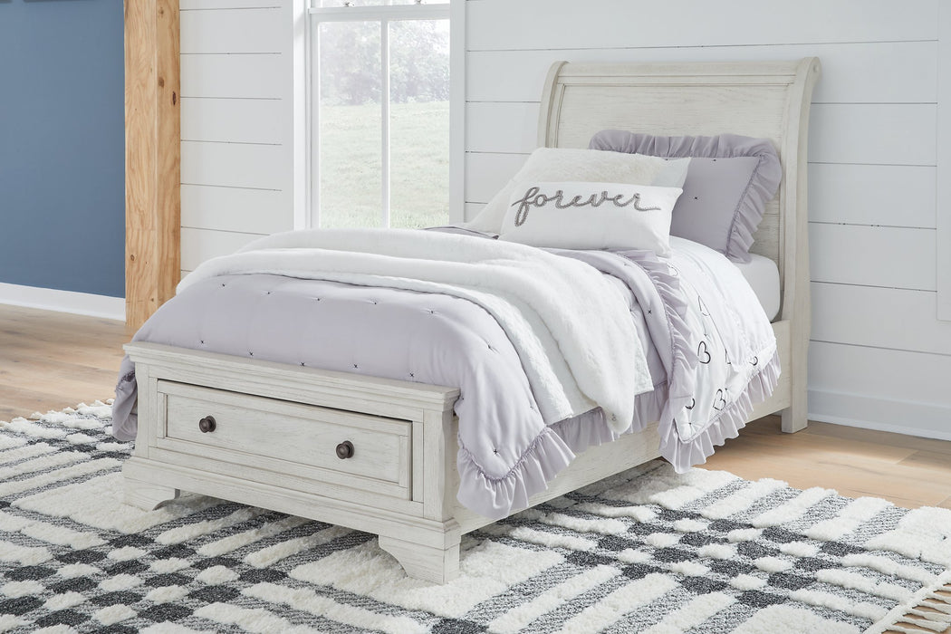 Robbinsdale Sleigh Storage Bed - Home And Beyond