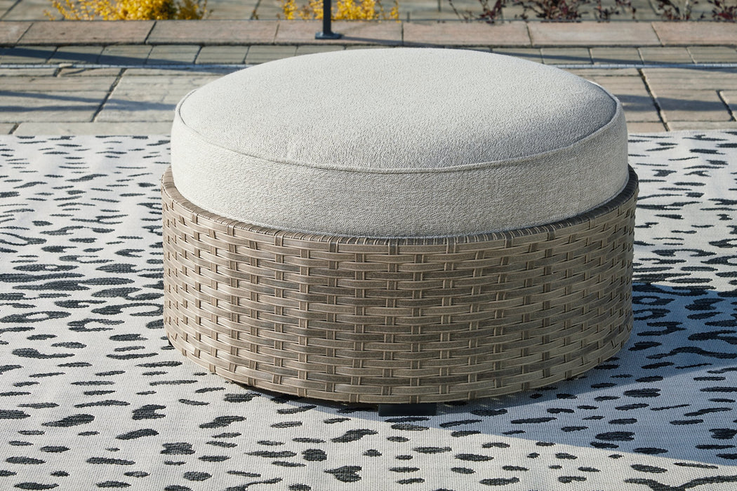 Calworth Outdoor Ottoman with Cushion - Home And Beyond