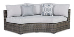 Harbor Court Curved Loveseat with Cushion - Home And Beyond