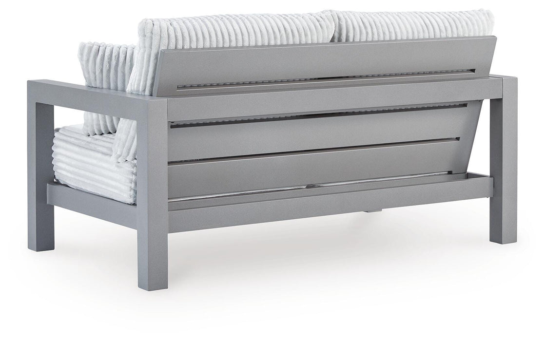 Hurley Park Outdoor Loveseat with Cushion - Home And Beyond