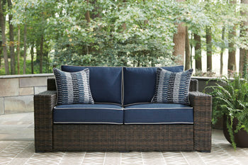 Grasson Lane Grasson Lane Nuvella Loveseat with Fire Pit Table - Home And Beyond