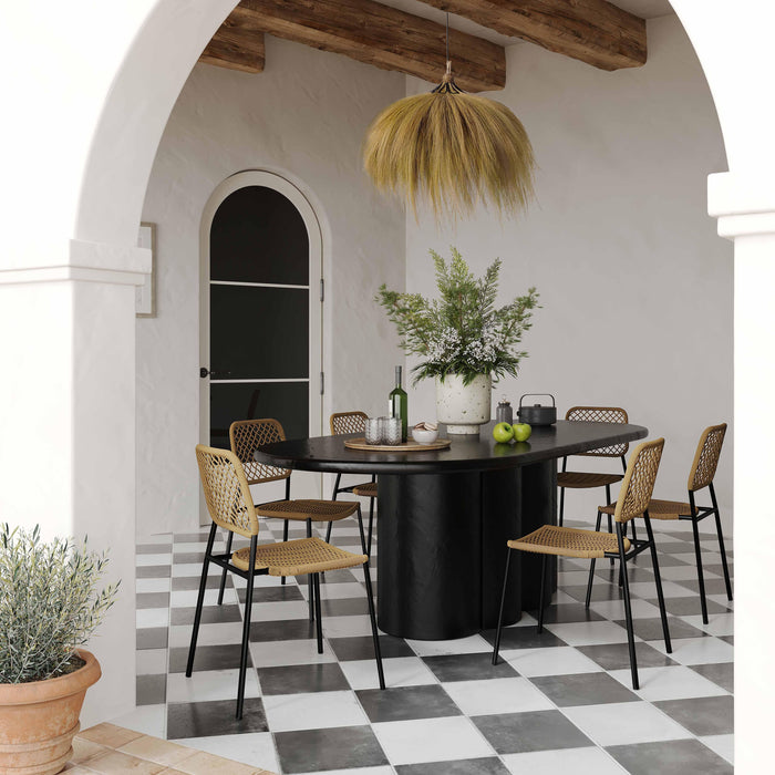 Elika Black Faux Plaster Oval Dining Table - Home And Beyond